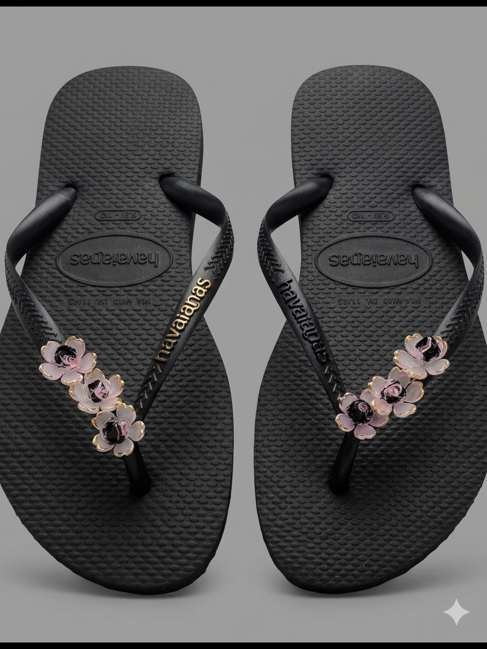 Havaianas Black Flip Flops with Pink Flower Embellishments